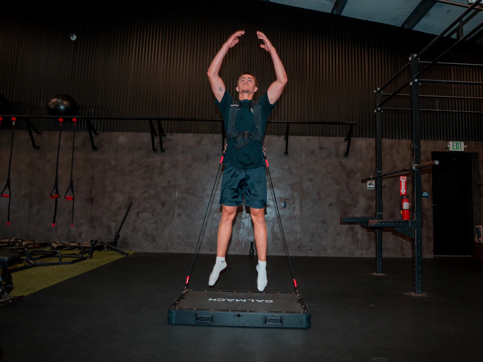 Athlete doing plyometric jumps on the Calmach platform
